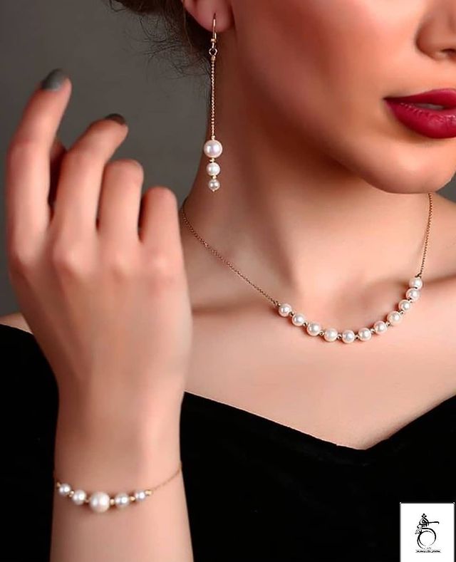 دستبند مروارید و طلا.jpg